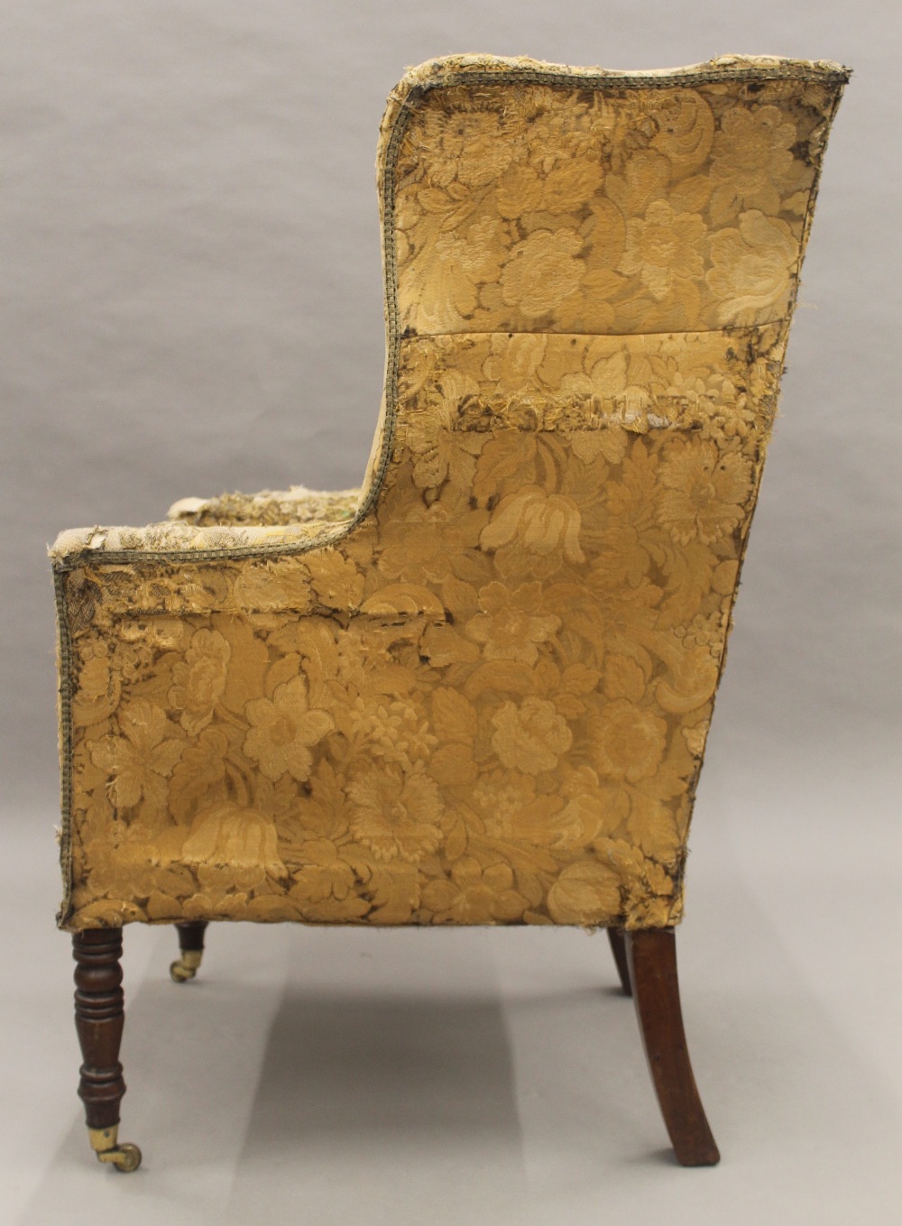 A 19th century upholstered wing back armchair. 73 cm wide. - Image 6 of 8