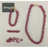 An X jewellery necklace and bracelet.