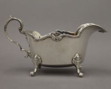 A silver sauce boat. 16.5 cm long. 6.1 troy ounces.