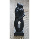 A Terrazzo garden sculpture, Balinese loving couple in black terrazzo. 80 cm high.