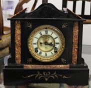 A Victorian black slate and marble mantel clock. 29 cm high.