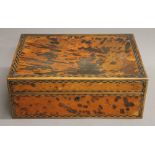 A 19th century tortoiseshell box. 31 cm wide.