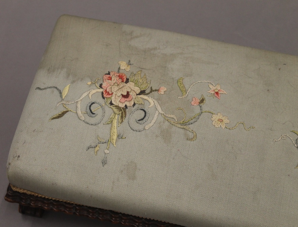 A Victorian tapestry covered foot stool. 112 cm long. - Image 3 of 5