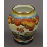 A small modern Moorcroft enamel vase. 7.5 cm high.