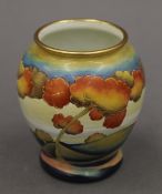 A small modern Moorcroft enamel vase. 7.5 cm high.