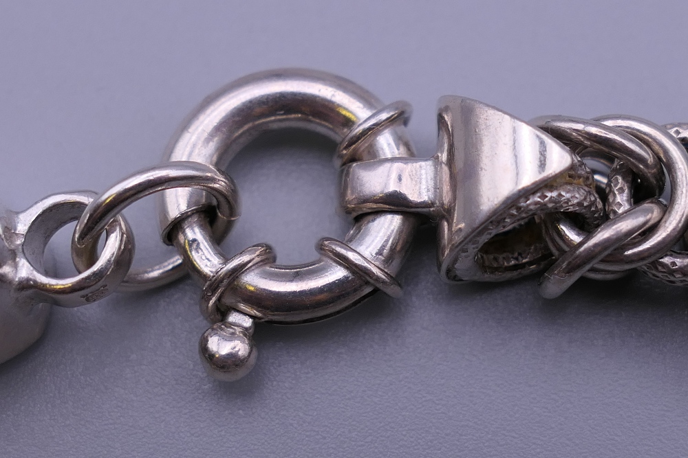 A silver ladies entwined link bracelet. 19 cm long. 31.2 grammes. - Image 3 of 4