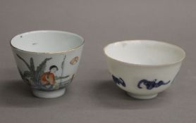 Two small Chinese porcelain tea bowls. The largest 5.5 cm high.