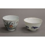Two small Chinese porcelain tea bowls. The largest 5.5 cm high.