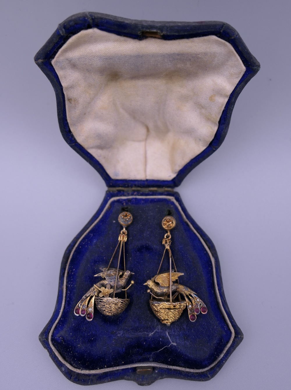 A pair of Victorian unmarked birds in nest earrings, in original fitted box. 3.5 cm high.