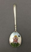 A silver enamel spoon depicting Miss Muffet. 10.5 cm long.