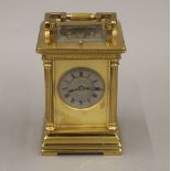 A 19th century brass cased repeating carriage clock. 14 cm high.
