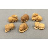 Six small carved bone animals. Each approximately 3 cm wide.
