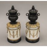 A pair of 19th century marble and bronze candlesticks. Each 21 cm high.