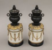 A pair of 19th century marble and bronze candlesticks. Each 21 cm high.