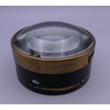 A large lens. 11.5 cm diameter.