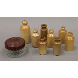 A quantity of miniature Doulton Lambeth bottles. The largest 7.5 cm high.