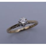A 9 ct gold diamond solitaire ring. Ring size J. 1.2 grammes total weight.