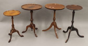 Four various mahogany wine tables.