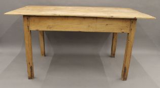 A Victorian pine kitchen table. 146.5 x 77.5 cm.