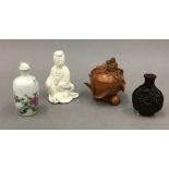 A small Chinese porcelain blanc de chine figure of Guanyin,