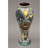 A modern Moorcroft Balloons pattern vase. 27 cm high.