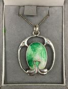 An Arts and Crafts silver and enamel pendant by Charles Horner, hallmarks for Chester 1909,