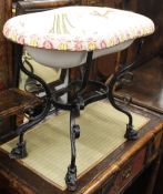 A 19th century porcelain bidet, in wrought stand.