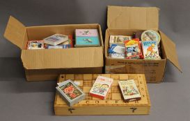 A boxed chess set and a large collection of vintage playing cards