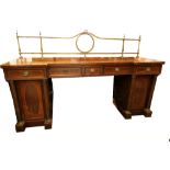 An Edwardian George III style inlaid mahogany pedestal sideboard. 214 cm wide.