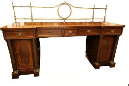 An Edwardian George III style inlaid mahogany pedestal sideboard. 214 cm wide.