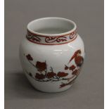 A Chinese porcelain bird feeder. 6 cm high.
