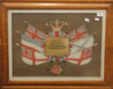 A Victorian maple framed wool work picture, centred with a print of HMS Captain. 71 x 55.