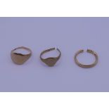 Three 9 ct gold rings. 7.9 grammes.