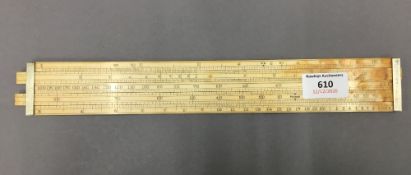 A 19th century ivory slide rule, inscribed 'J Long, 20 Little Tower Street London'. 32.5 cm long.