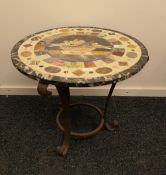 A marble specimen stone inlaid circular table top decorated with Pliny's doves on a wrought iron