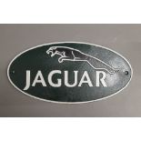 A Jaguar metal sign. 35 cm wide.