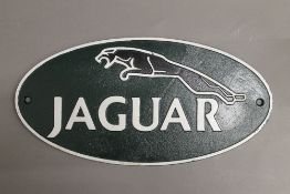 A Jaguar metal sign. 35 cm wide.