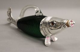 A silver plated fish claret. 33 cm long.