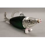 A silver plated fish claret. 33 cm long.