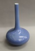A Chinese blue ground porcelain vase. 37 cm high.