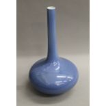 A Chinese blue ground porcelain vase. 37 cm high.