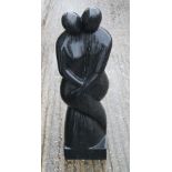 A Terrazzo garden sculpture, Balinese loving couple in black terrazzo. 80 cm high.