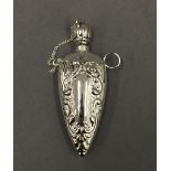 A silver pendant scent bottle. 6 cm high.