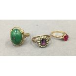 Three various stone set 9 ct gold rings. 7.5 grammes total weight.