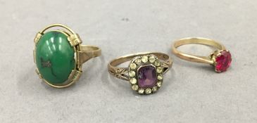 Three various stone set 9 ct gold rings. 7.5 grammes total weight.