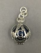 A silver Masonic lapis ball pendant. 2.5 cm high.