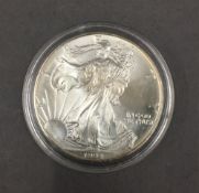 A 1 ounce silver dollar