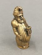 A brass vesta formed as Mr Punch. 5 cm high.