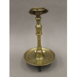 A Persian brass oil lamp. 30 cm high.