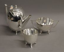 A three piece silver plated Deco tea set